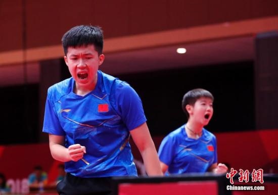 資料圖：雅加達亞運會，王楚欽/孫穎莎奪得混雙冠軍。 <a target='_blank' href='/'>中新社</a>記者 劉關(guān)關(guān) 攝