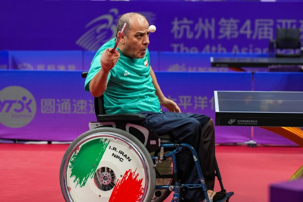 10月23日，杭州第4屆亞殘運會乒乓球男子單打Class2小組循環(huán)賽舉行。圖為伊朗隊選手哈?！ず嗁M尚在比賽中。圖片來源：杭州亞殘組委會