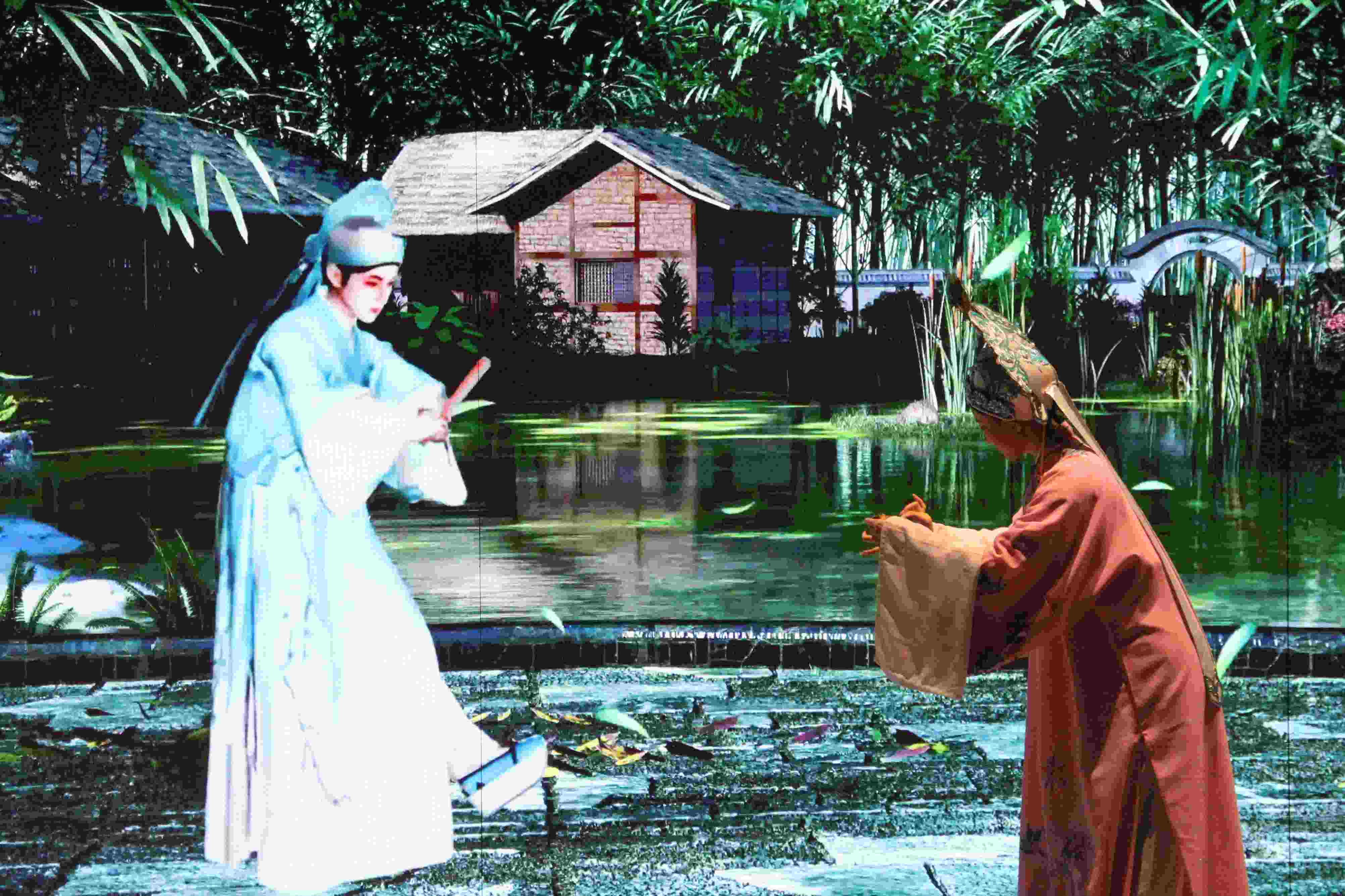 真人演員與虛擬人演員在“元啟金陵”南京數(shù)字文化客廳出演《梁山伯與祝英臺》經(jīng)典選段。受訪者供圖